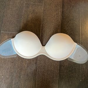 Never worn, out of box, STRAPless and BACKless bra with sticky sides. B-cup